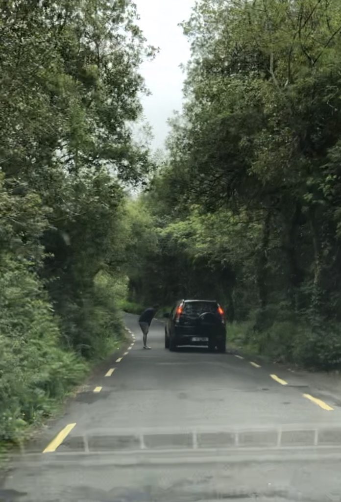 Narrow road with a car